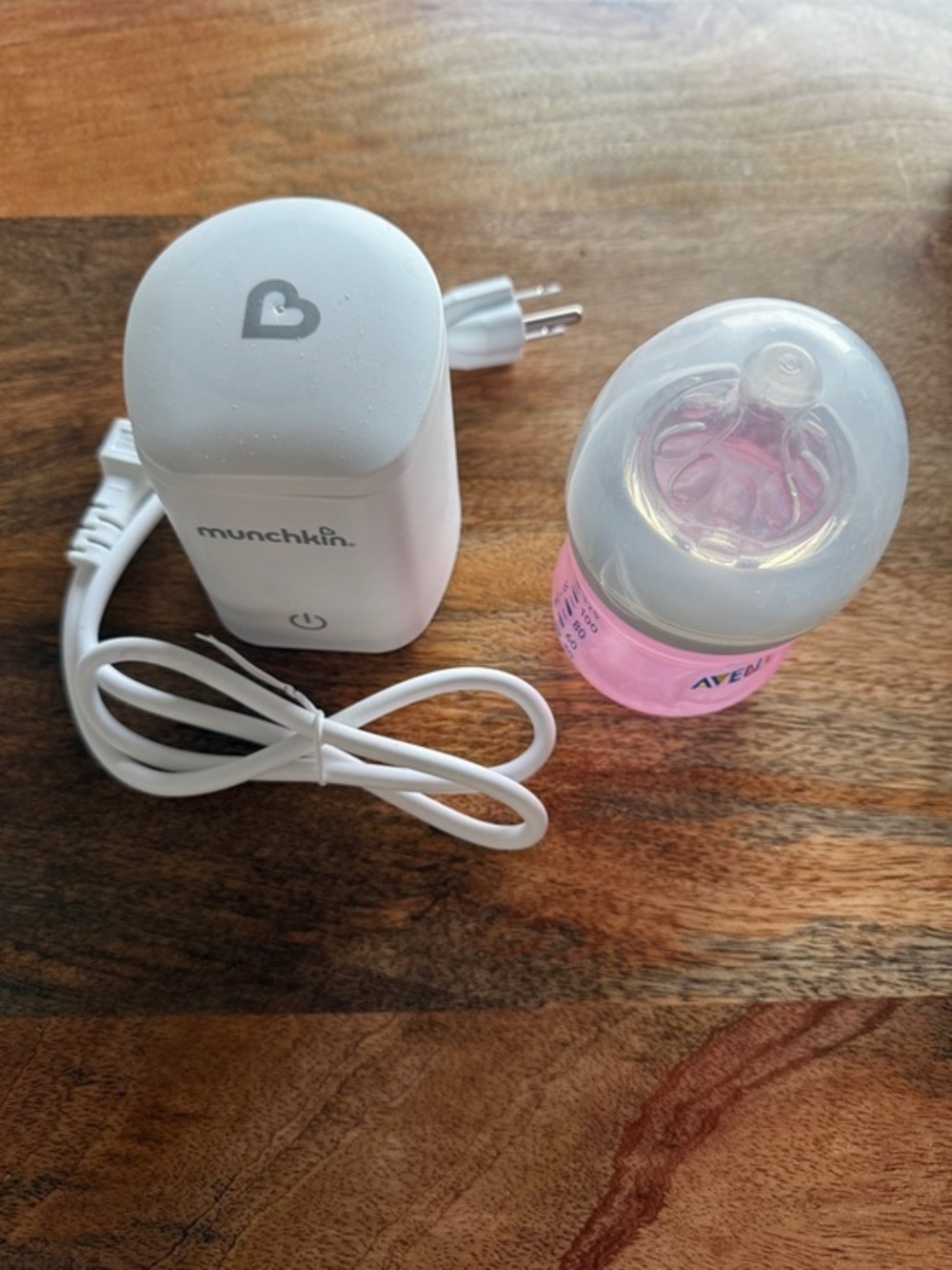 Munchkin White Bottle Warmer with Pink Baby Bottle